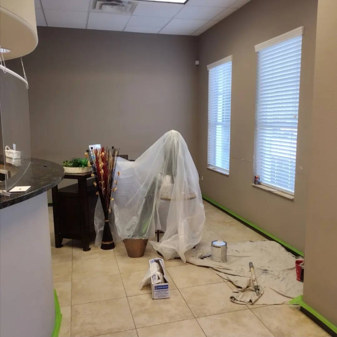 Office reception masked off before repainting