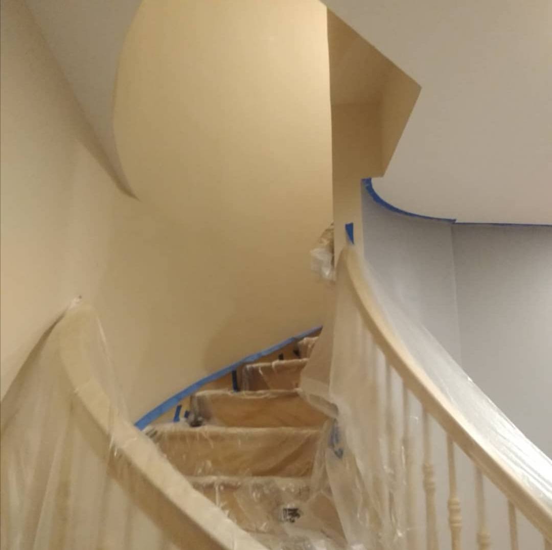 Stairwell fully draped and taped